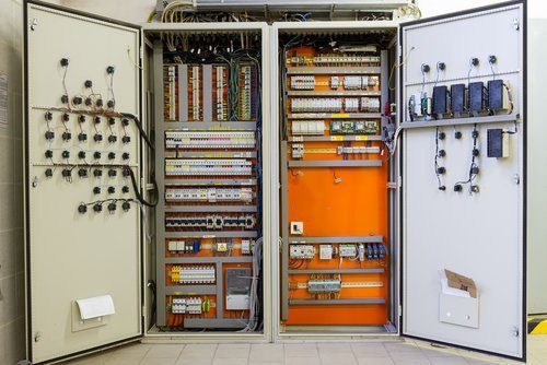 Electricity distribution box with wires, circuit breakers and fu Electrical distribution box with wires, circuit breakers, and fuse box